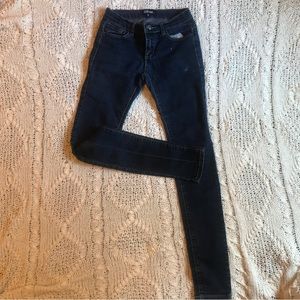 low waisted dark blue wash skinny jeans